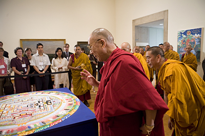 Dalai Lama with sand mandala