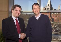 Jeff Lehman and Bill Gates shake hands