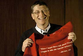 Bill Gates holds T-shirt