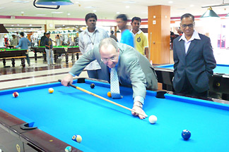 Skorton and Murthy relax with a game of pool