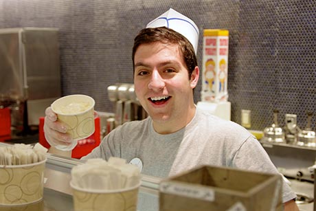 Student serving ice cream