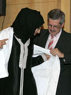 Dean Alonso helps Buthina Al Mulla