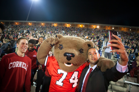 Svante Myrick and Touchdown the Bear