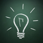 Lightbulb illustration on blackboard.