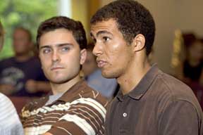 Calvin Selth '07 listens to Randy Lariar '08