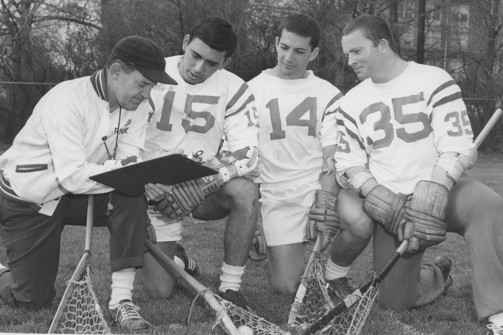 Ned Harkness with lacrosse players