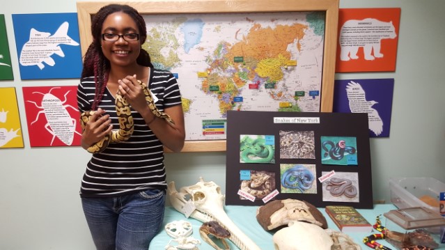 Morgan Shelton holds a python