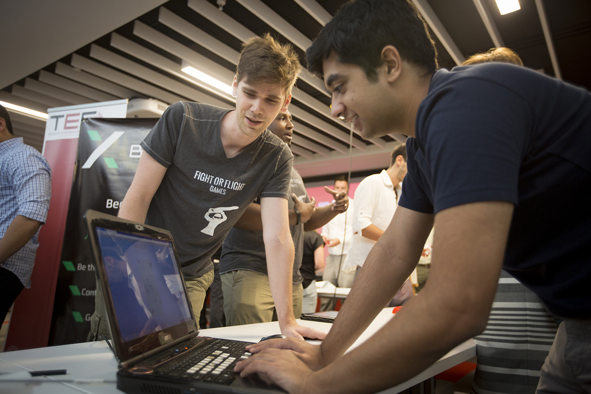 eShip pair looks at computer