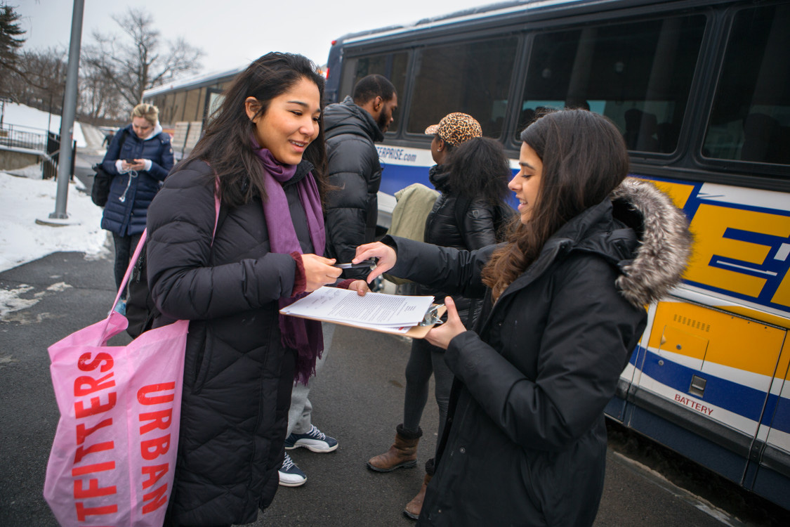 Posse students getting on bus