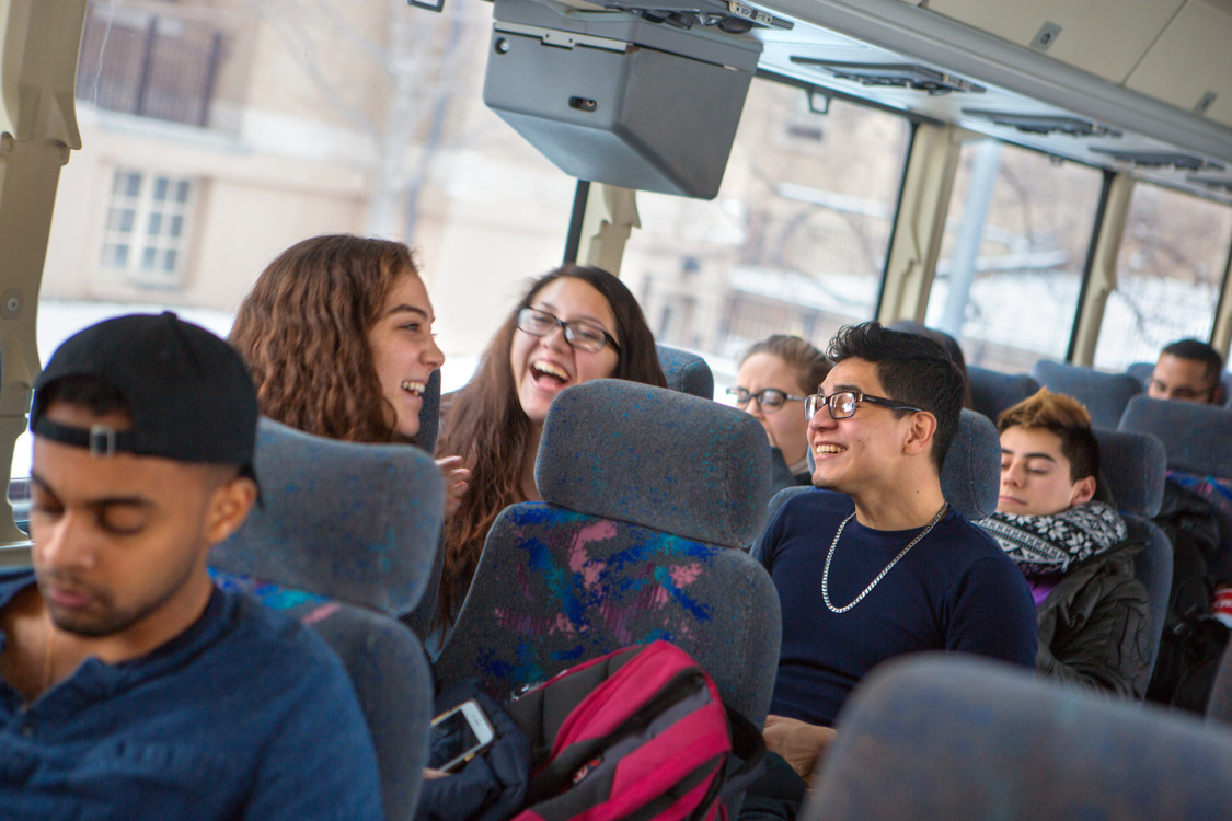 Posse students getting on bus