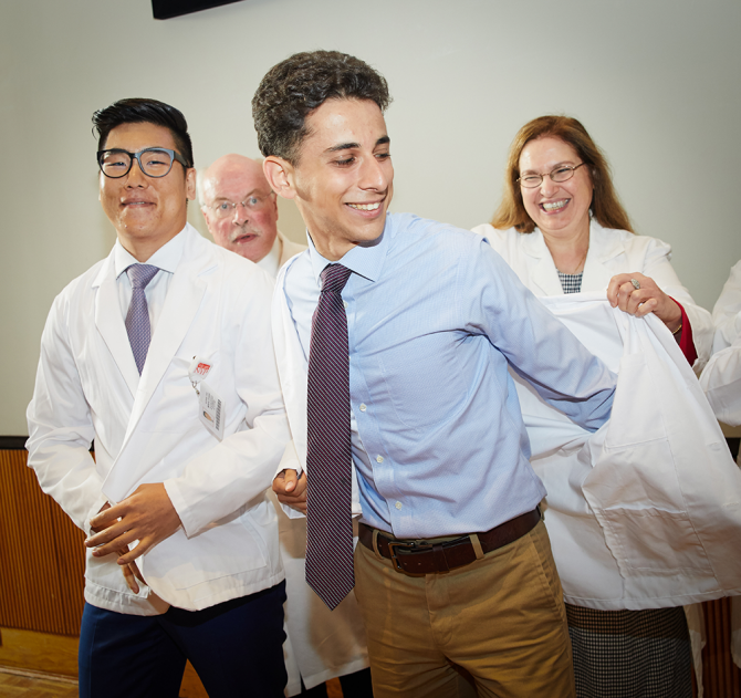 Weill students receive white coats