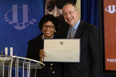 Ruth Simmons presents David Skorton with a certificate 