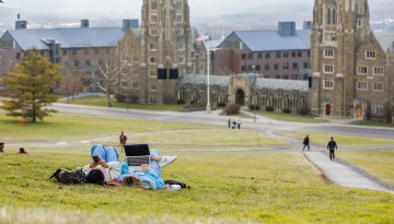 Students relax on Libe Slope.