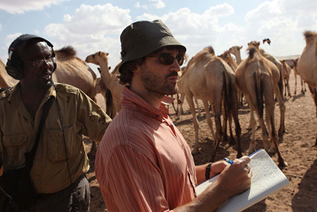 Gentleman with camels