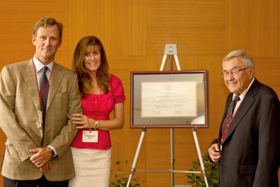 Stephanie '84 and Peter '80, MBA '82, Nolan with Peter's father, David Nolan '49