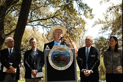 Secretary of the Interior Ken Salazar, center, discusses the 2010 State of the Birds Report on Climate Change in Austin, Texas, as, from left, Glenn Olsen, Paul Schmidt, John Hoskins and Miyoko Chu look on.