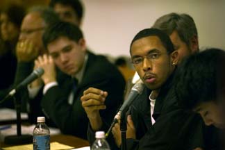 Justin Davis talks as Eric Shive listens