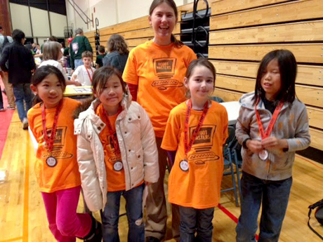 Robin Bjorkquist with some of the girls from the Robot Masters LEGO team