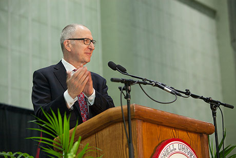 Skorton at podium