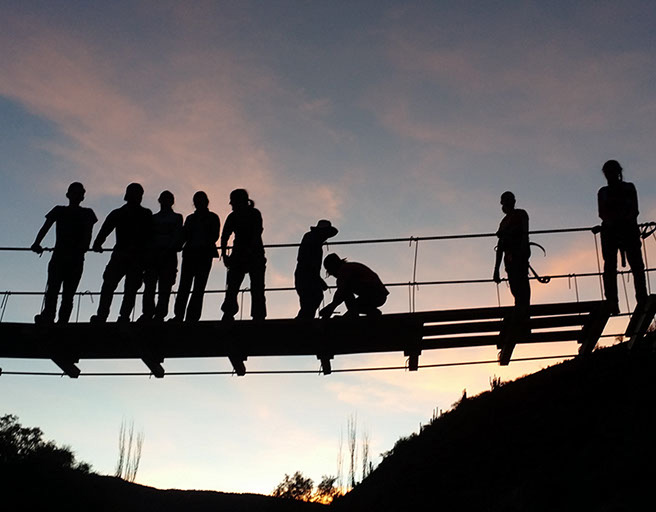 Bridge building at sunset