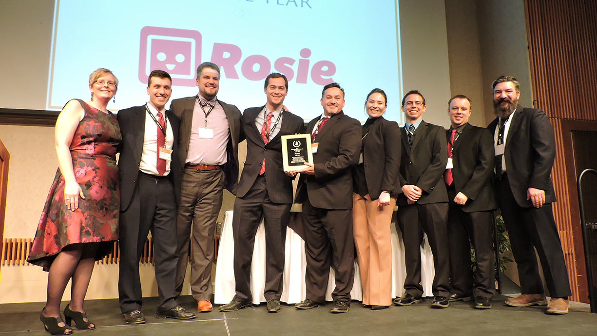 Rosie Applications team accepts Chamber of Commerce Award