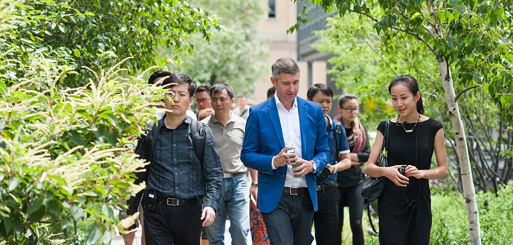 Richard Kennedy walking with architects