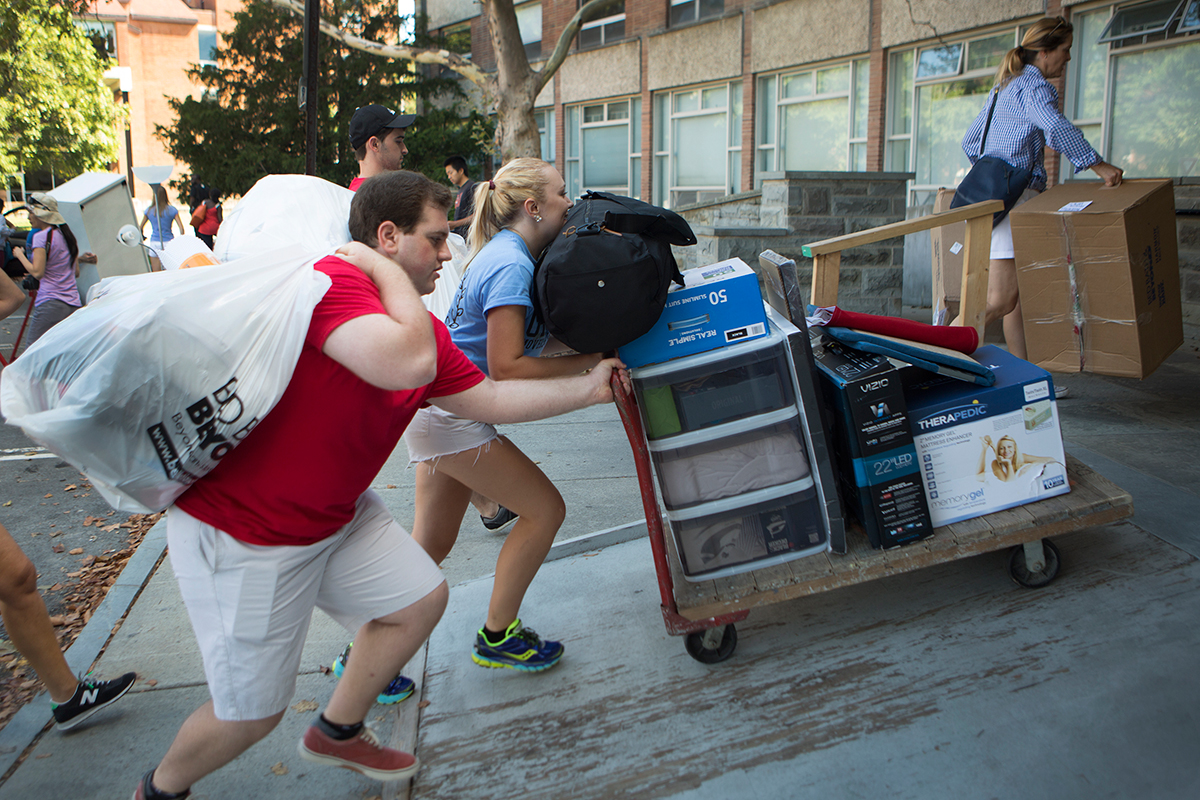Students pushing things up ramp