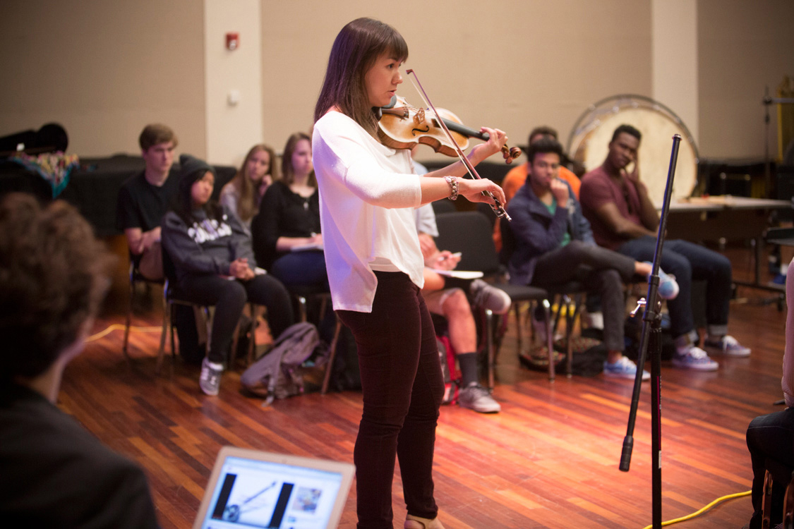 Ariana Kim playing violin