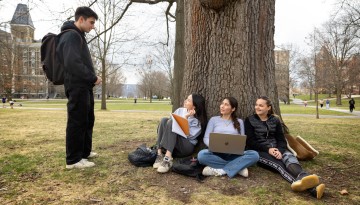 Students chat on the Arts Quad.